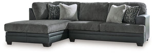 Appeal to your eye for ultra-contemporary design with this sectional. Chic and sleek in dark neutrals, it pairs cozy fabric with faux leather for invitingly cool character. And with a roomy chaise offering extra seating space, family and friends can chill