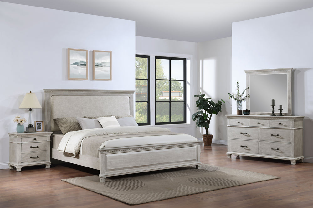 The Silver Sands 4 Piece Wood Bedroom Set in Gray offers a harmonious blend of durability and style, perfect for any bedroom. This set includes an upholstered panel bed, a dresser, a mirror, and a nightstand. Each piece is crafted from solid pine, manufac