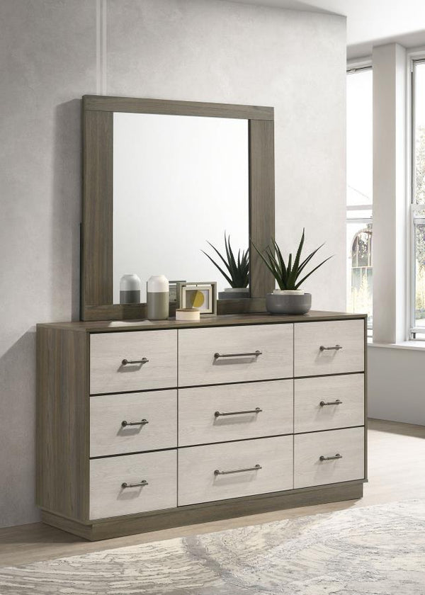  blending contemporary style with functional design. The nine-drawer dresser offers ample storage