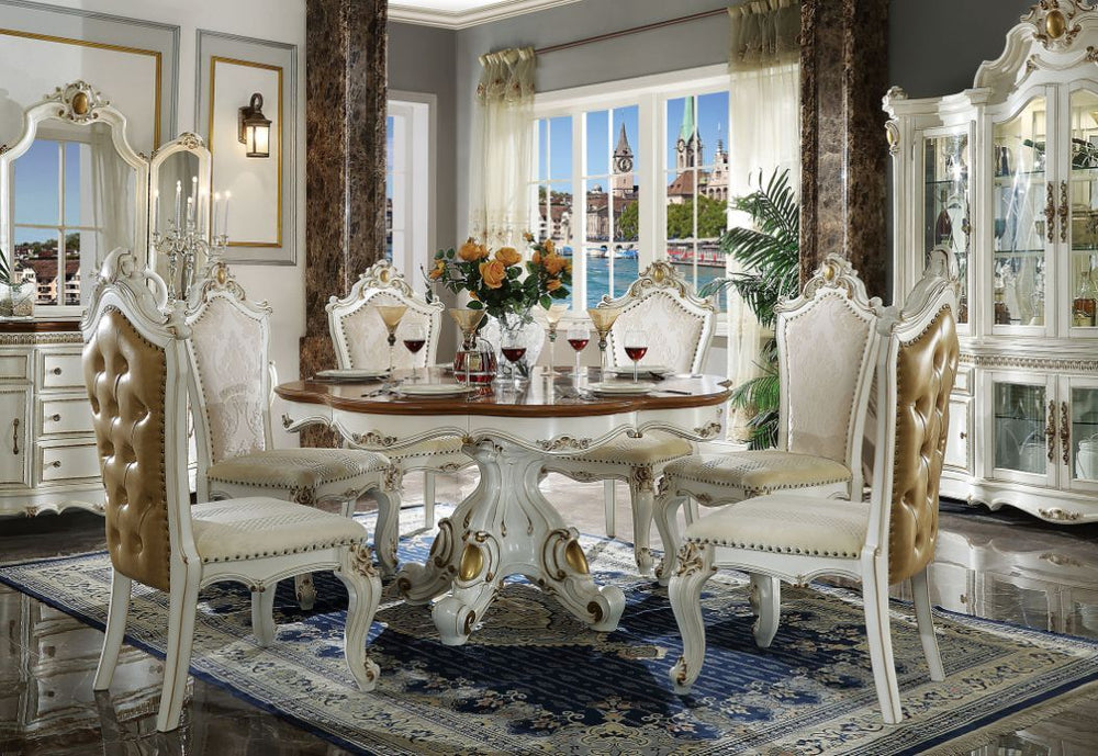 Inspire your home and create an upscale atmosphere with the Picardy dining room collection. This dining room table adds classic style to any sitting area featuring a traditional handcrafted design. The single pedestal table features ornate feet, an intric