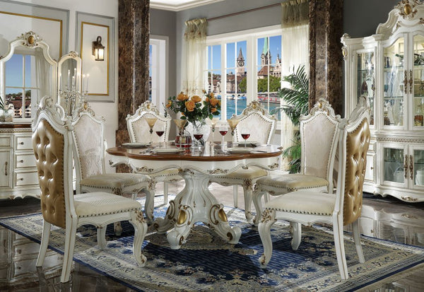 Inspire your home and create an upscale atmosphere with the Picardy dining room collection. This dining room table adds classic style to any sitting area featuring a traditional handcrafted design. The single pedestal table features ornate feet, an intric