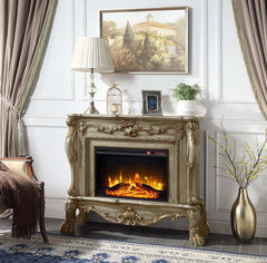 Add warmth and comfort to any room in your home with the impressive Dresden fireplace in a gold patina finish. The grand fireplace features floral moldings throughout the piece. Sitting on carved claw feet or added elegance. The fireplace features a touch