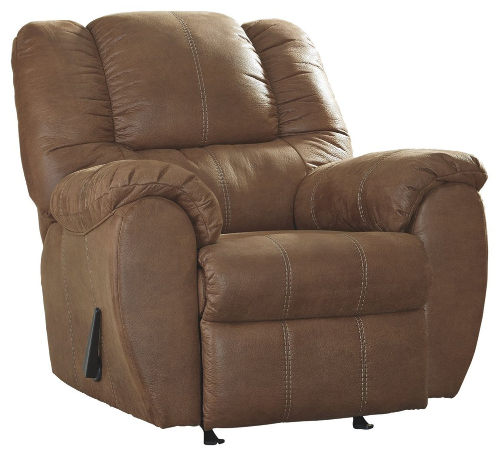 Rock the cool look of leather and the warm feel of fabric with this rocker recliner. Sporting sumptuously thick cushioning, fashion-forward jumbo stitching and a richly tailored aesthetic, this smartly priced recliner with gentle rocking motion is a bests