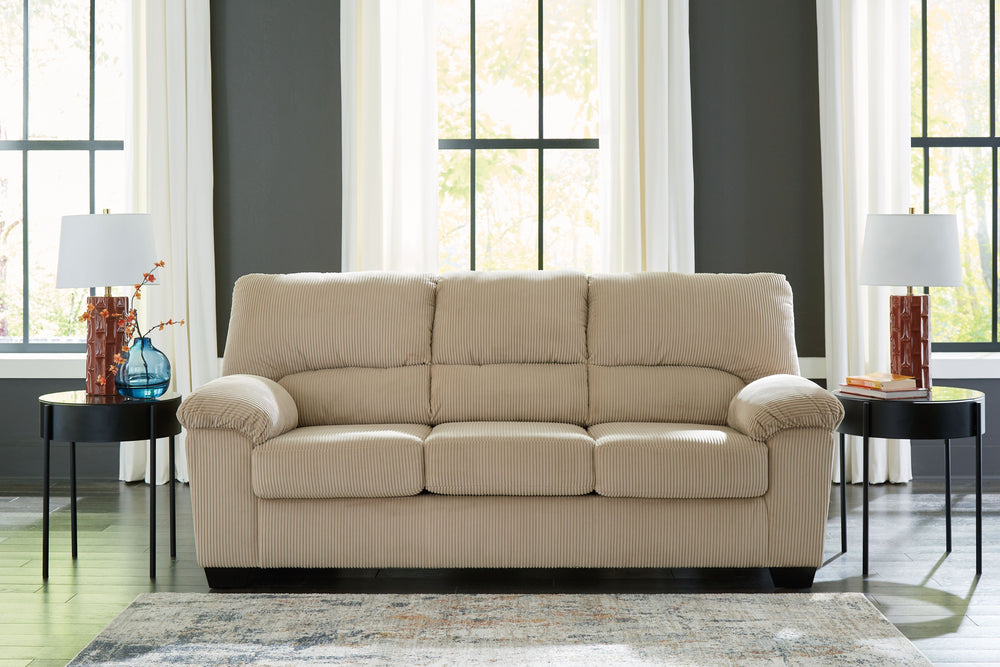 This sofa is a cozy interpretation of casual contemporary style. Its super-soft corduroy makes curling up with a book or your favorite show that much more comfortable. You-'re sure to appreciate its sincere styling and homey approach to relaxation.<br><br