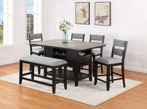 Bring a fresh look to your dining space with this breezy counter height group. The table has an array of design features, including drawers, bottle storage, and an open bottom shelf. Ladderback chairs and bench are upholstered in a Chevron pattern fabric 