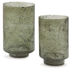 Create an even cozier ambiance in your home with this candle holder set. Their green sanded glass makes the soft glow of electric or real candles all the more beautiful. Stunning when displayed as a duo or standing alone, these holders are a simple way to