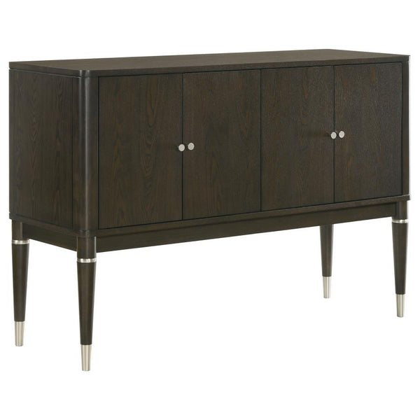 Add both style and functionality to your dining room with this elegant sideboard, finished in a sophisticated ash brown wood tone. The clean-lined design features four cabinet doors that open to reveal spacious shelving, perfect for storing tableware, lin