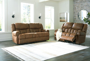 Expansive elegance. This set makes a sizable style statement. Its large scale enhances the luxe appearance, magnifying the beauty of richly warm brown faux leather. Polishing off the piece is one-touch power reclining, which adds a layer of function to th