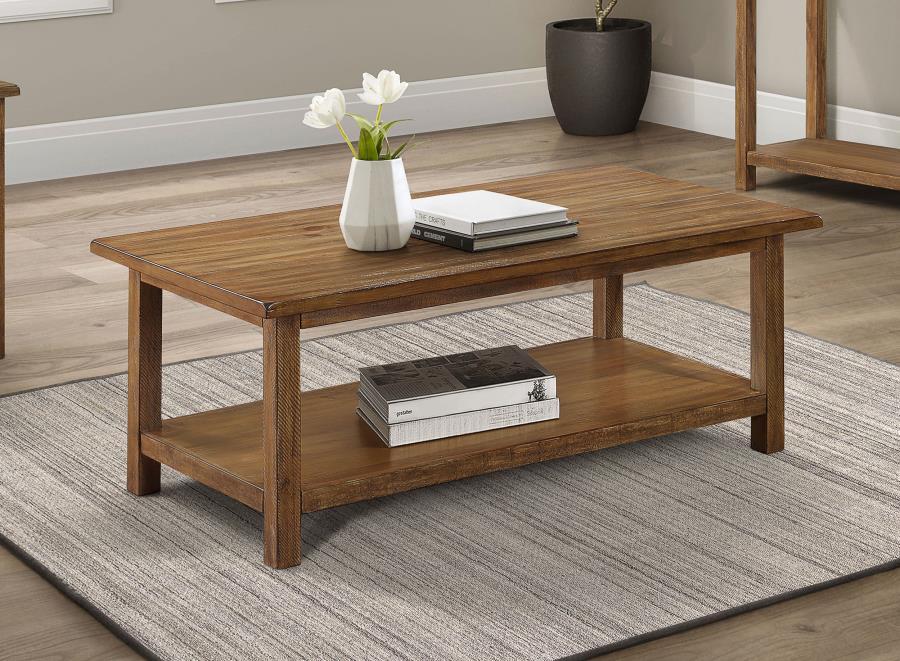 Bring timeless appeal and ample surface space to your living area with this rectangular coffee table. A pine wood and engineered wood construction, enhanced by pine veneer, ensures durability while exuding a warm rustic charm. Its open lower shelf keeps d