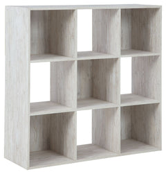 If itâ€™s coastal chic or cottage quaint style you long for, the Paxberry whitewashed nine-cube organizer invites you to go to town. Its distinctive weatherworn finish conveys an easy-breezy sensibility, perfect for a restful bedroom retreat. Open and clo