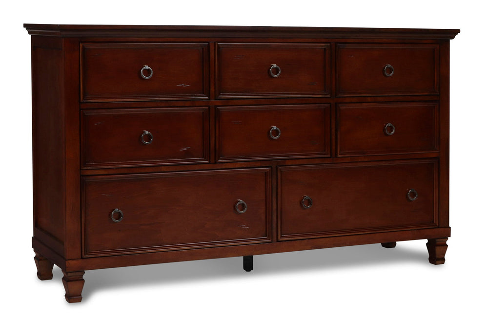The Tamarack 8 Drawer Wood Dresser in brown cherry offers a perfect blend of durability and style. Built with a combination of solid poplar, basswood veneers, and eco-friendly manufactured wood, this dresser ensures strength and long-lasting durability. I