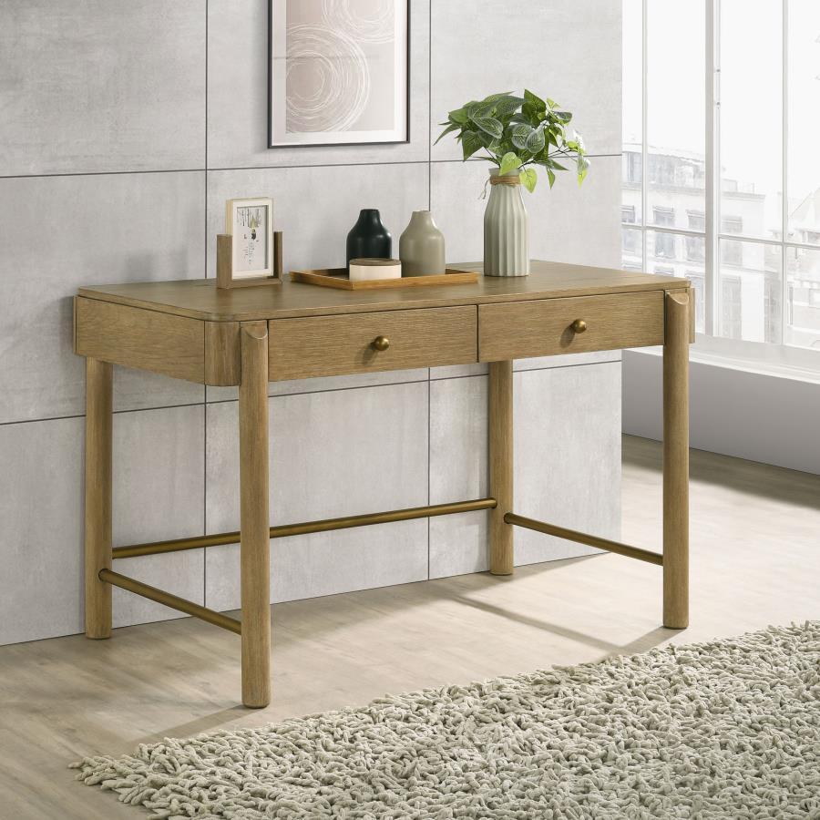 Complete your bedroom or living area with a multi-functional modern coastal vanity desk with a hint of glam personality. Its soft sand finish is rich but neutral, complementing in virtually any setting and showcasing wood grain details. Two drawers create