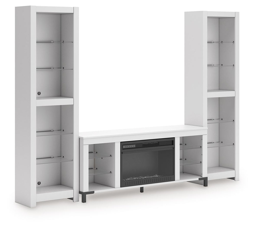 Level up your gaming experience and make movie nights to remember. This entertainment center with fireplace extends your entertainment beyond the screen. Its built-in fireplace brings the heat, synchronizing with LED backlighting on the assorted shelves. 