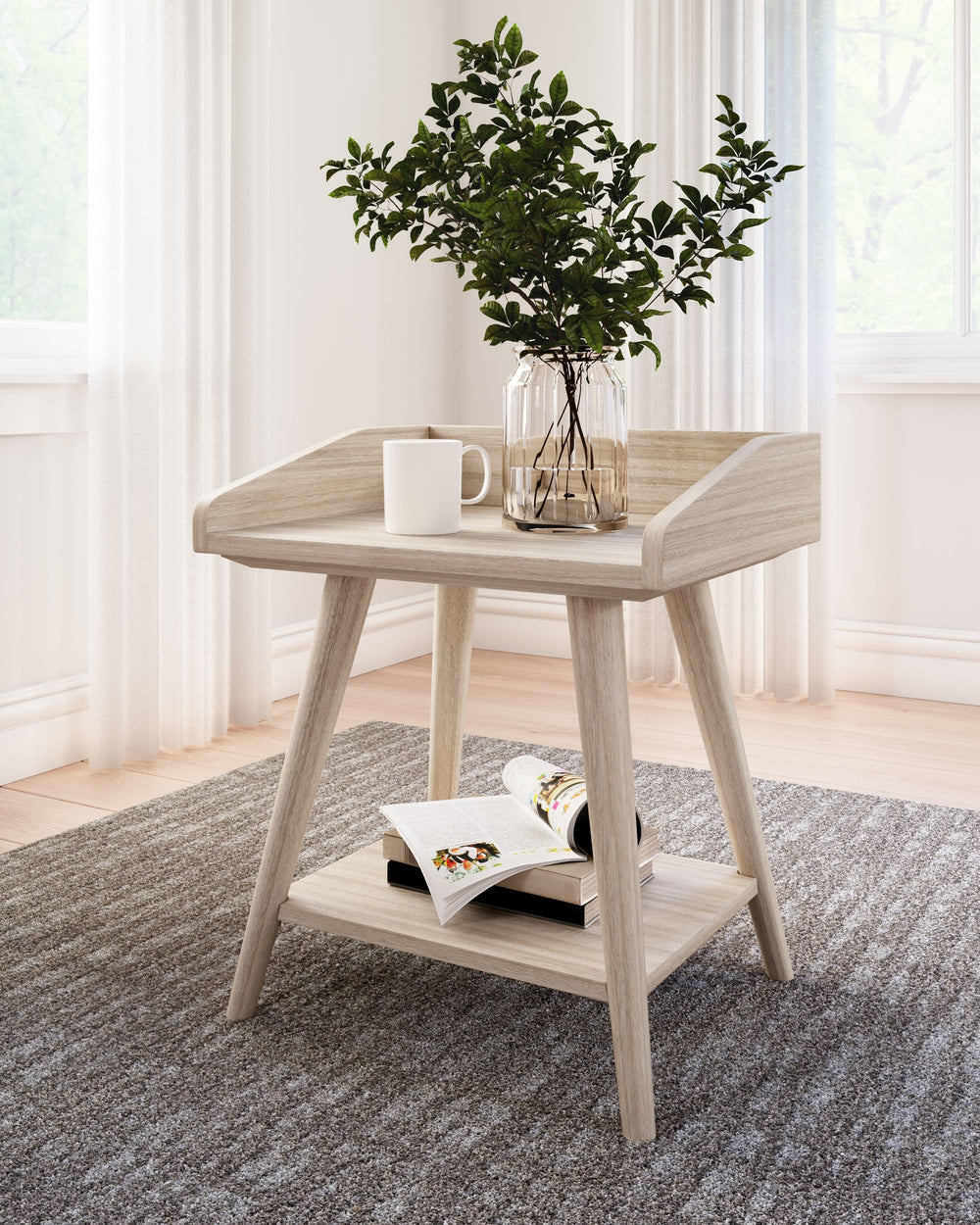 Display decor with simple style on this artful accent table. Constructed of wood, engineered wood and veneer in a light tan finish, it blends easily with your existing living room aesthetic. A gallery rail top, undermount shelf and dual USB chargers keep 