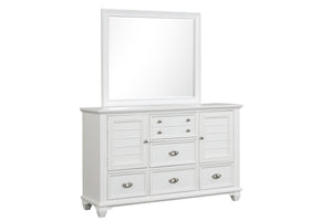 The Jamestown Dresser Mirror in White is a perfect blend of durability and style, designed to complement any bedroom decor. Expertly crafted from solid Acacia, premium manufactured woods, and authentic Oak veneers, this mirror ensures long-lasting durabil