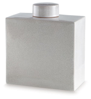Crafted with an off-white crackle effect, this ceramic jar has a classic, antiqued feel well-fitted to new traditional spaces. Whether it-'s adding a finishing touch to your dining room or den, the accent piece brings dimensionality to your decor.<br/><br