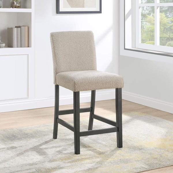  a blend of simplicity and texture. Wrapped in the luxurious touch of boucle fabric