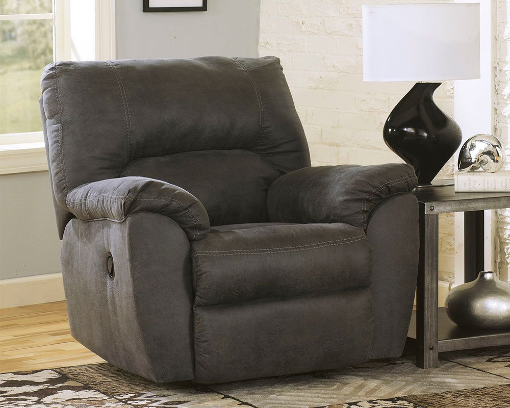 With plush cushions and angled pillow top arms, this rocker recliner takes comfort to a whole new level. Faux vintage leather requires minimal care, making this piece ideal in homes with children and pets. The seat reclines with the pull of a tab, putting