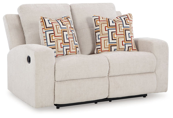 This reclining loveseat invites you to a luxuriously soft lounging experience. The chic hue fits right in with contemporary color palettes. A tufted back keeps the look right on trend. Balancing style and function, its pull tab reclining effortlessly take
