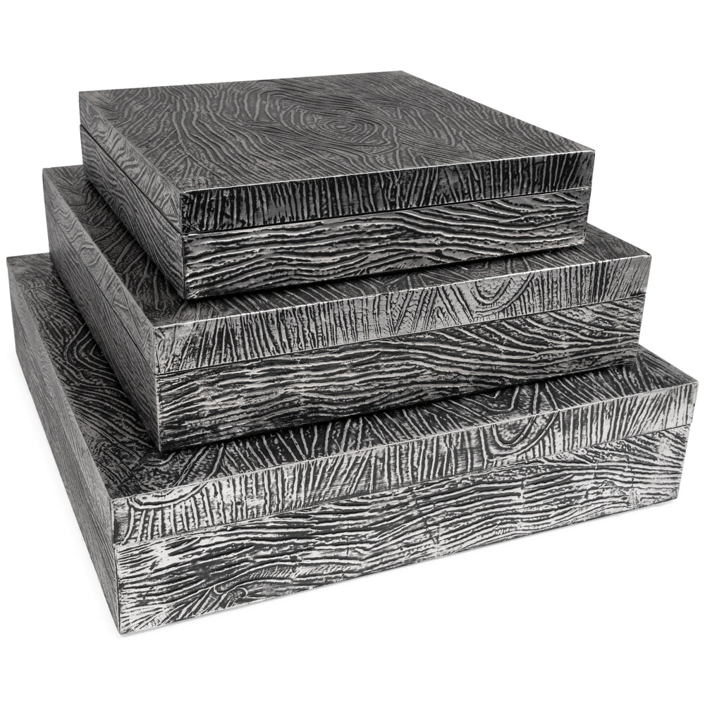 Ideal for a dresser, chest or accent table, this set of three wood and metal boxes is a contemporary choice for the forward-thinking modernist. The antiqued pewter-tone finish is an inspired touch.<br><br><b>Additional Dimensions</b><br><ul><li>Box-small:
