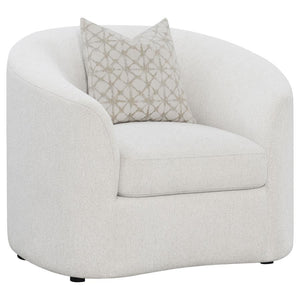Elevate your contemporary living room reading nook with this elegant contemporary lounge chair, upholstered in a neutral latte finished boucle fabric throughout its contoured silhouette and curved sloped armrests. Accented by a single throw pillow, this s