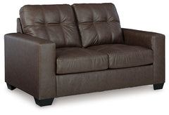 Everyday comfort meets versatile style in this loveseat. The handsome hue of the goes-with-anything faux leather takes away the stress of styling, expertly pairing with your existing aesthetic. From kicking back on the weekends to relaxing post-work, livi