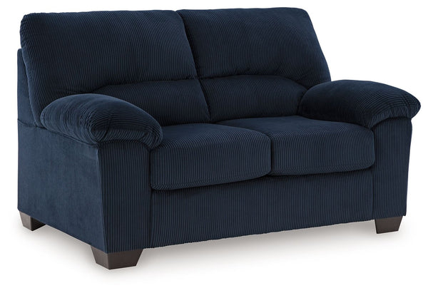 This loveseat is a cozy interpretation of casual contemporary style. Its super-soft corduroy makes curling up with a book or your favorite show that much more comfortable. You-'re sure to appreciate its sincere styling and homey approach to relaxation.<br