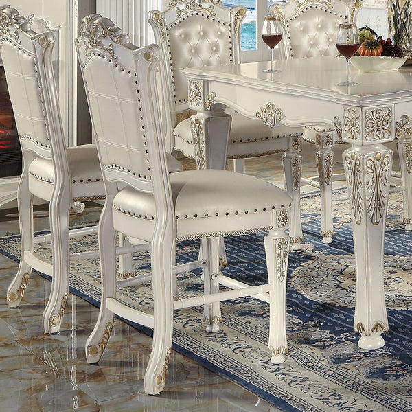  Armless Chair Padded Seat & Back Cushion: PU with Nailhead Trim (Button Tufted Inside Backrest) Wooden Seat Apron with Molding Trim Wooden Tapered Leg & Footrest Supports: Floral Motif