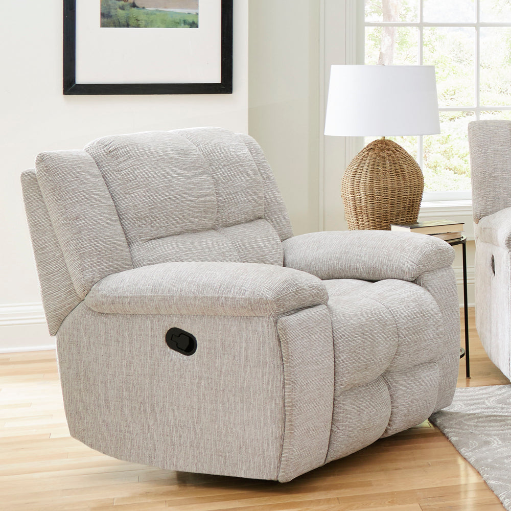Big and cozy, but make it fancy! The Buster Manual Recliner does just that. Exaggeratedly large plush cushions and a smooth reclining mechanism creates oversized lounging space that beckons you to take a load off. The luxurious buff cover is made from hig