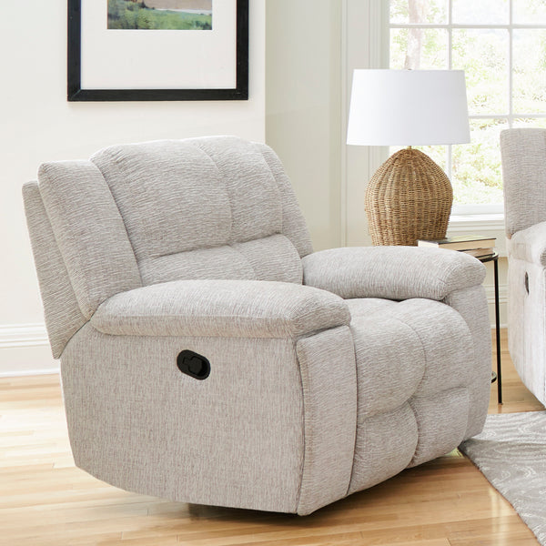  but make it fancy! The Buster Manual Recliner does just that. Exaggeratedly large plush cushions and a smooth reclining mechanism creates oversized lounging space that beckons you to take a load off. The luxurious buff cover is made from hig