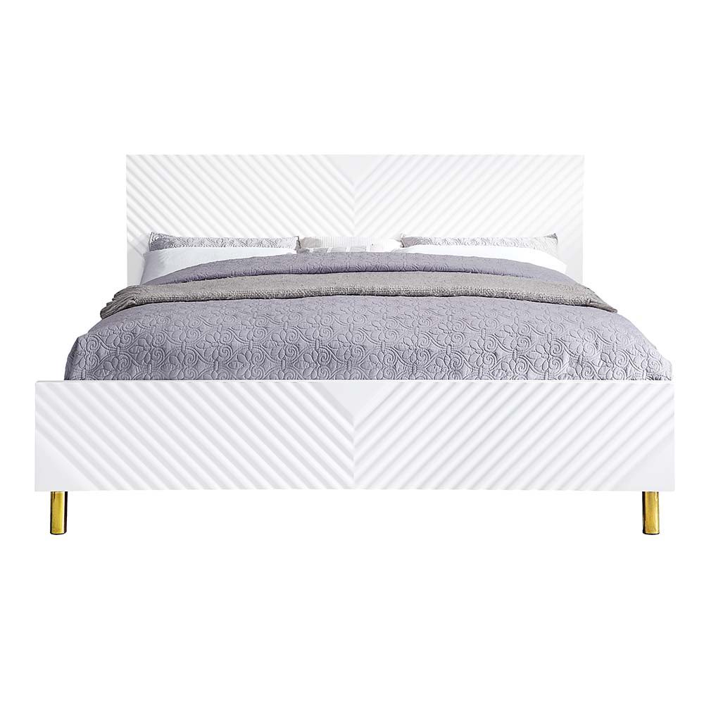 The Gaines Collection is a glamorous and sophisticated grouping that adds a chic style to any room. The white gloss finish and gold metal accents help to accentuate the clean lines of the pieces and add a pop of glamour. The diagonal line design adds visu