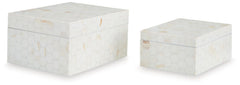 Looking for a casually cool home accent? This set of boxes stacks up beautifully. A hexagonal mosaic design and cream finish bring a laid-back element to your decor. What a stylishly effortless way to refresh your shelves and tabletops.<br><br><b>Addition