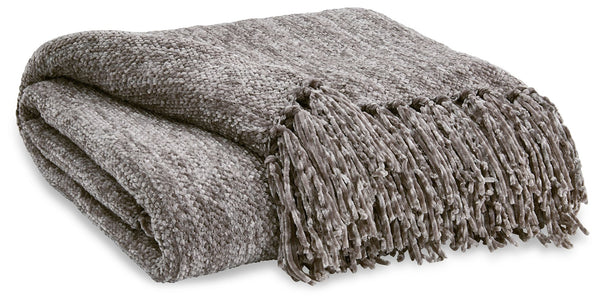 A lovely layer to cozy up with, this gray throw blanket also makes a stylish statement. Whether draped over the arm of a sofa or folded at the foot of a bed, the woven texture and knotted fringe give it a homespun look that-'s relaxed and inviting.<br/><b