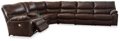 Bring home ultimate comfort with this power reclining sectional. Along with power positioning at the push of a button, its deep seating, plush cushions and pillow top arms ensure plenty of relaxation. The strikingly modern profile is wrapped in decadently