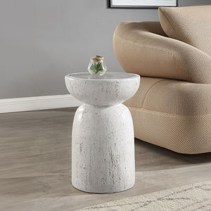 Introduce our Dylana round accent table brings a touch of modern elegance with its fixed table top and faux concrete finish in a nature gray hue. Perfect for contemporary spaces, its minimalist design adds sophistication to any room, making it a stylish a