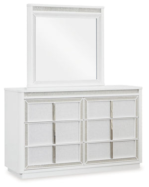 Transform your bedroom with the Chalanna dresser and mirror. Its modern design and glamorous details create a sophisticated retreat. The built-in LED lighting and rhinestone-framed drawers add style and practical storage. Let your sanctuary shineâ€”and ne