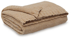 Comfort meets casually chic style in this throw blanket. Its gold hue and knitted construction create trendy textural variation when draped over a sofa or the foot of a bed. And it goes beyond style, with the soft chenille fabric acting as a cozy companio