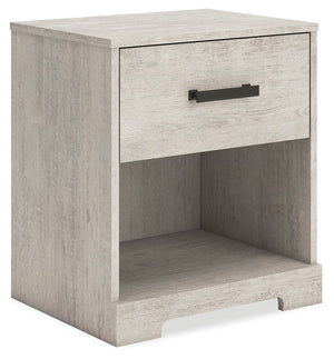 Give casual a new meaning with the chic look of this nightstand. A light gray finish over replicated oak grain keeps it laid-back and inviting, while the substantial warm pewter-tone hardware adds a modern farmhouse touch. The open cubby provides display 