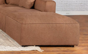  perfect for modular seating setups. Upholstered in a richly toned fabric with a tailored self-welt cushion
