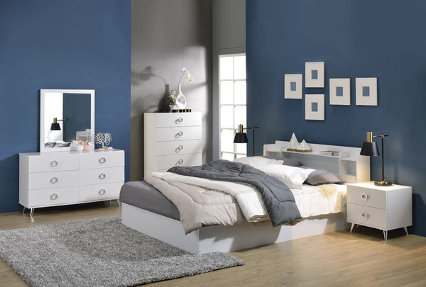  and functional are what best describe the Perse collection. The crisp white finish gives off the illusion of a bigger room. The low-profile panel bed features a storage headboard to display various goods. The case goods offer plenty of stor