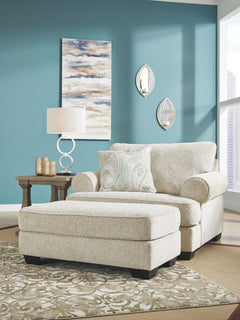 For a fresh spot in your space, turn to this designer chair and ottoman. Wind down at the end of a long day when you sink into this canyon of comfort. <h4><b>Monaghan - Sandstone - Chair and a Half</b></h4> <table width=-"100%-"><colgroup><col style=-"wid