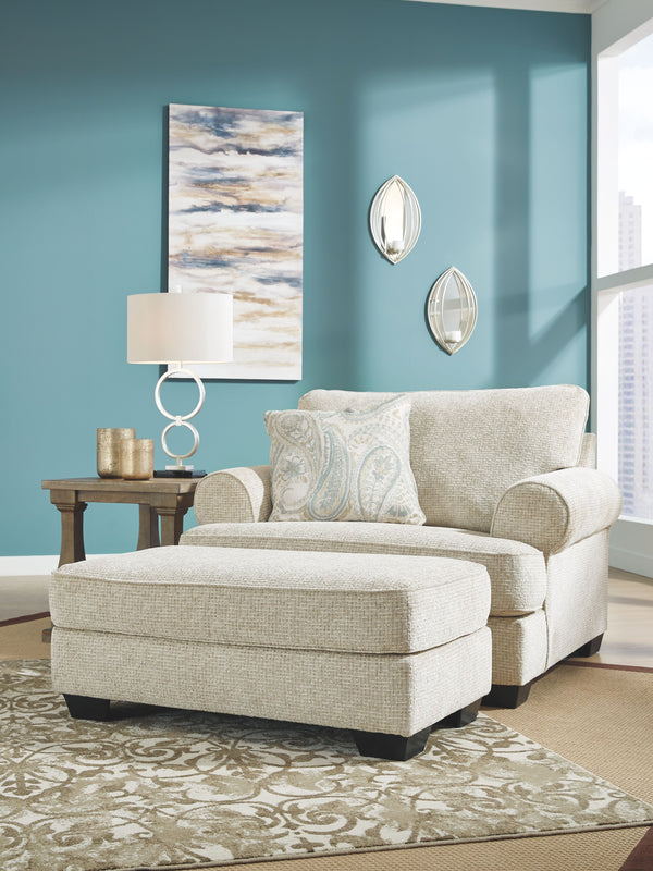 For a fresh spot in your space, turn to this designer chair and ottoman. Wind down at the end of a long day when you sink into this canyon of comfort. <h4><b>Monaghan - Sandstone - Chair and a Half</b></h4> <table width=-"100%-"><colgroup><col style=-"wid