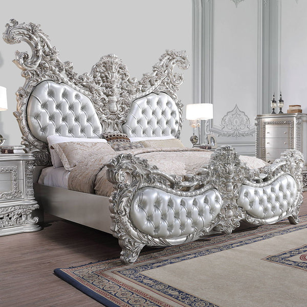Characterized with button-tufted upholstery, intricate scrollwork, and lustrous finish, the Valkyrie Bedroom Collection provides the feeling of luxury and sophistication. Ornate carvings with floral scroll design on each piece boast extravagant silhouette