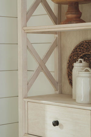  decorations and more? This tall three-shelf display cabinet is a dream come true. The textured antiqued white finish provides a perfect backdrop for presentation. For the items you want to hide