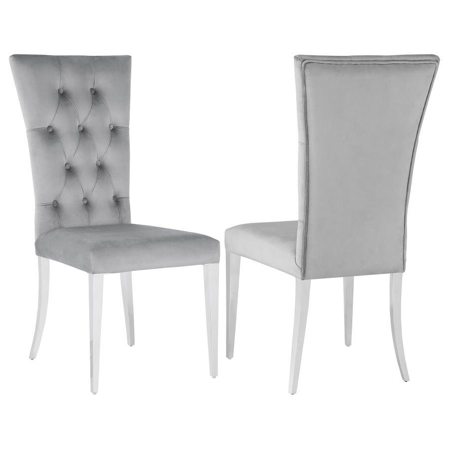 Transform your dining area into a chic space with this elegant, modern glam side chair set. Designed in a classic Parson style silhouette, these two chairs boast a tall curved back for extra comfort and support throughout long dinners. Upholstered in a pl