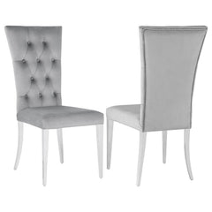 Transform your dining area into a chic space with this elegant, modern glam side chair set. Designed in a classic Parson style silhouette, these two chairs boast a tall curved back for extra comfort and support throughout long dinners. Upholstered in a pl