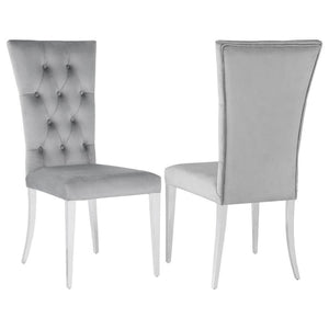 Transform your dining area into a chic space with this elegant, modern glam side chair set. Designed in a classic Parson style silhouette, these two chairs boast a tall curved back for extra comfort and support throughout long dinners. Upholstered in a pl