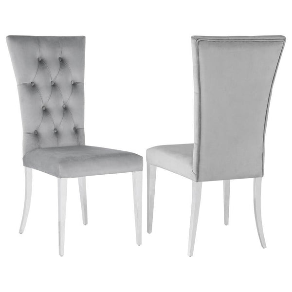 Transform your dining area into a chic space with this elegant, modern glam side chair set. Designed in a classic Parson style silhouette, these two chairs boast a tall curved back for extra comfort and support throughout long dinners. Upholstered in a pl