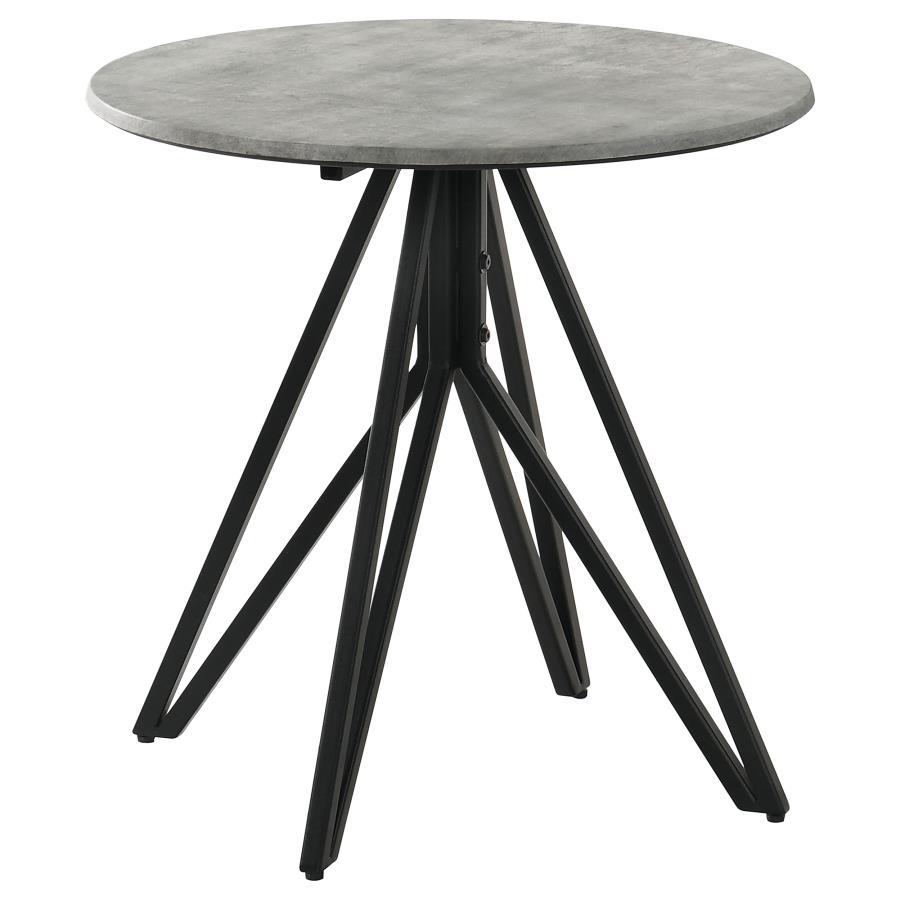 Industrial elements and sleek modern lines bring forth this modern end table. A metal butterfly-like base design of open and flared hairpin style legs in a gunmetal finish offer a striking visual interest to the furniture piece and the room in which is re