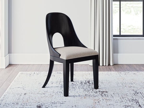  the Rowanbeck home office desk chair makes a lasting impression in a simply stunning way. The magnificence of its trend-right curved silhouette is enhanced with a rich layered black finish over a textured wood grain finish. It